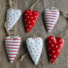 6 x Herzen Metall Tupfen  7.4