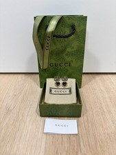 Goldene GG Gucci Ohrringe mit