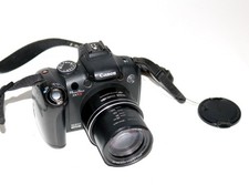 Canon PowerShot SX1 IS 10,0 MP Digitalkamera Schwarz Kamera