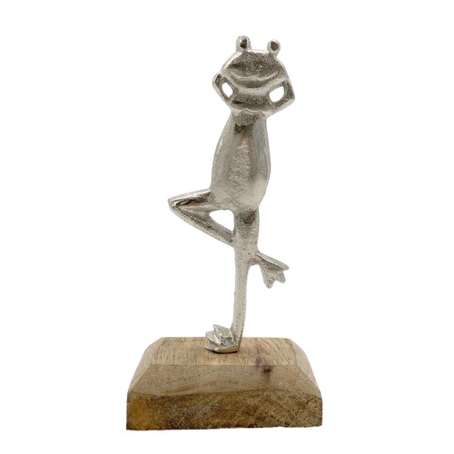 Metallfrosch auf holzfuß - metallfrosch,