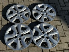 4x Opel Corsa E Adam 15 ZOLL RADKAPPEN  / 13380644