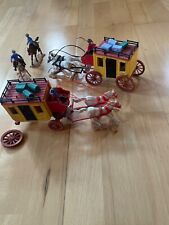 Timpo Toy Figuren: zwei Postkutschen, Kutscher, Zubehör, Gangster und Pferde