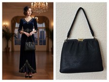 Vintage Leder-Handtasche schwarz mit messingfarbenem Verschluss