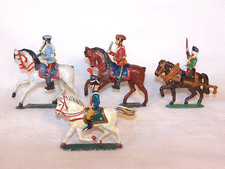 4 alte, vollplastische Kavallerie Zinnfiguren, H. 1x 60 und 3x 70 mm