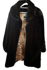 Kunstpelz Mantel von Pompöös, Gr.46