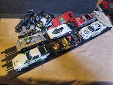 7 x 1:24 Slot Car u. 4 Karossen  f. Carrera Bahnen. Konvolut