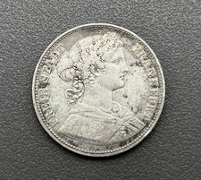 900/- Silbermünze, Ein