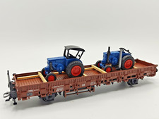 Märklin H0 46948 Rungenwagen mit Ladung, 2 Lanz Traktoren