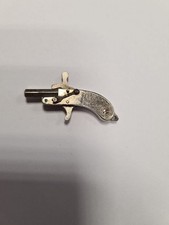 Winzige alte Miniaturpistole