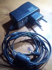 Netzteil Steckernetzteil Ladegerät Adapter  AC 100-240V    DC  9V 1A