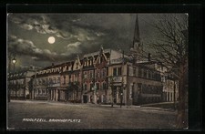 Mondschein-AK Radolfzell, Bahnhofplatz mit Friseur 