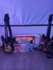Wii Gitarren + Logitech Schlagzeug und 4 Spielen