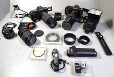 Canon T 70 - 2 analoge Spiegelreflex-Kameras mit Objektiven - ungetestet