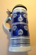Bierkrug mit Zinndeckel -