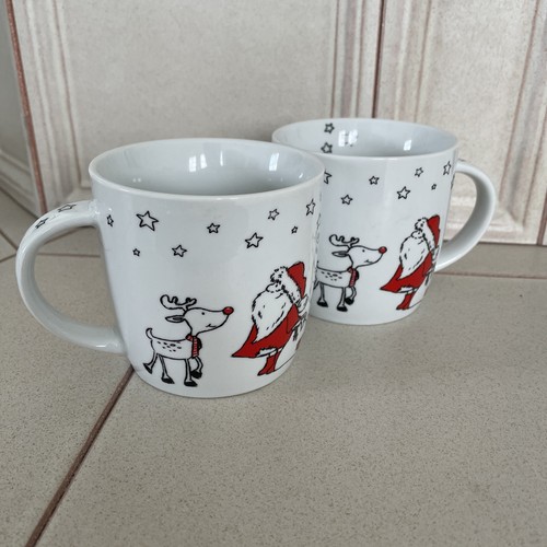 Zwei weihnachtliche tassen - tassen,