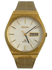 Luxuriöse goldene Herrenarmbanduhr NOS Ricoh Riquartz Day & Date, funktioniert