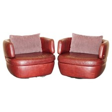 PAAR EXQUISITE BORDEAUX LEDER NATUZZI DREHSESSEL MIT LENDENKISSEN