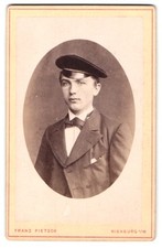 Fotografie Franz Pietsch, Nienburg /W., Porträt eines jungen Studenten mit Mütz 
