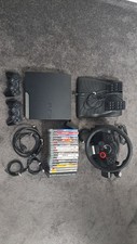 PlayStation 3 Slim Konsole Inkl. Spiele und Logitec Driving Force GT Lenkrad PS3