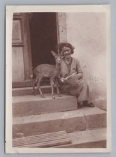 Woman Sitting On Steps With