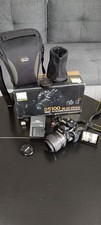 Nikon D5100 DSLR Camera with 18-55mm VR Kit Lens + Accessories