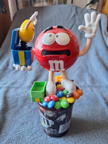 Figur mit handpuppe - m&m,