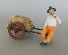 Hirte Bauer sitzend mit