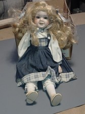 Konvolut mit 3 Porzellanpuppen