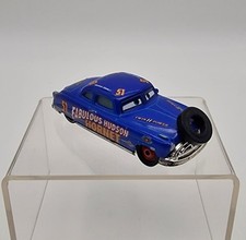 Mattel GKB57 - Hudson Hornet - Disney Cars Pixar mit Reifen / vorne Ersatzreifen