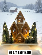 Weihnachtliche Holzhäuser mit