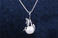 KX Meerjungfrau mit Perle