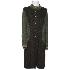 Catherine Andre, Strickjacke