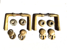 1 v. 2 Türgarnituren / Türbeschläge / Design F. Kramer, Bauhaus 