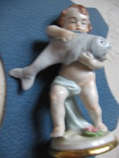 Putto Putte Kind mit großem