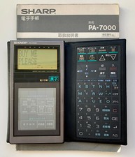 Sharp PA-7000 electronic organizer (similar to Wizard/OZ & IQ series) + manual