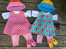 Puppenkleidung + Schuhe für