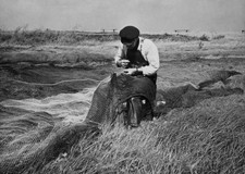 Fisherman Mending Net at