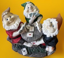 3 lustige Gartenzwerge als