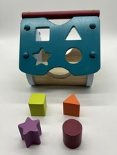 Steckspiel Haus aus Holz mit Uhr Motorik Formen