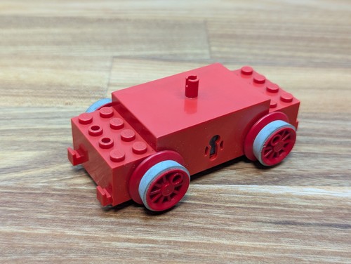 Lego red train engine - red,