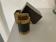 Altes Benzinfeuerzeug  Tischfeuerzeug  rund  mit Lederbezug  in OVP