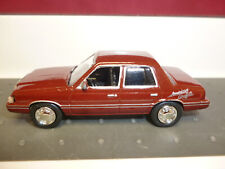 MOTORMAX :  1983 Plymouth Reliant "American Graffity" Nr. 6137 braun in 1:60 !