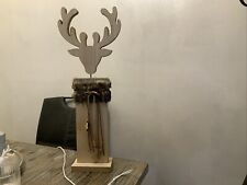 Großer Holzelch mit Fell