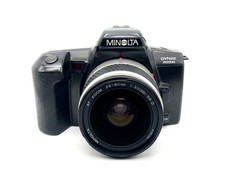 Minolta Dynax 303si + Minolta