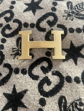 H Gürtelschnalle Gold