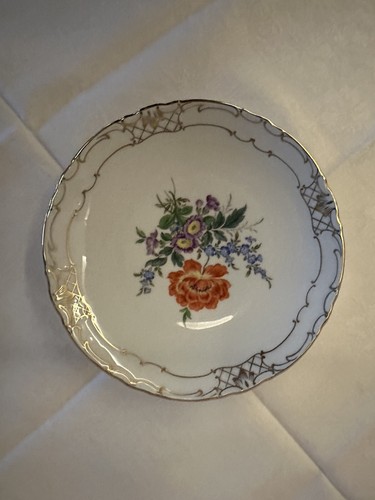 Zierteller mit blumendekor und - zierteller,