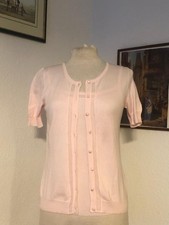 rosa Top und Strickjacke von