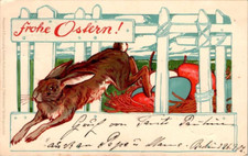 AK OSTERN HASE HASEN SPRINGT DURCH EINEN ZAUN COL. 1902