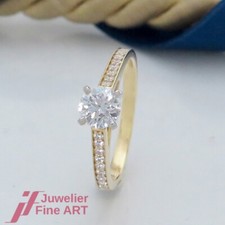 Brillant-Solitär-Ring mit Akzent 19 Brillanten ges. ca. 0,82ct- Gelbgold/Platin
