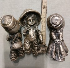 Drei vollplastische Figuren